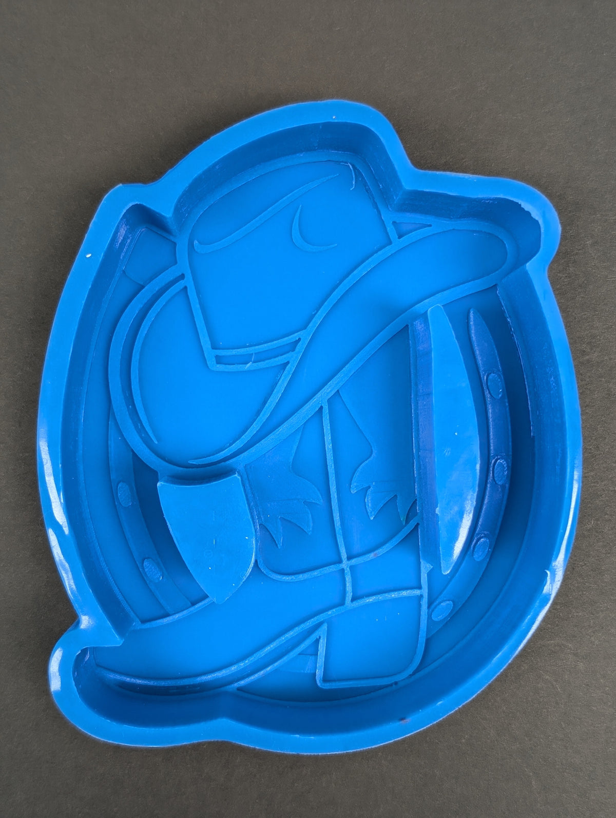 Horseshoe with Boot and Hat (50)
